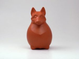 Hund sitzend rot